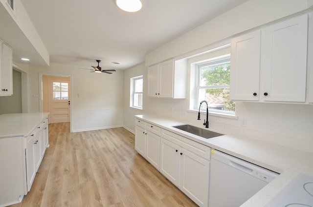 10623 Longmont Dr, Houston, TX 77042 - kitchen with dishwasher, tasteful backsplash, healthy amount of natural light, and a ceiling fan