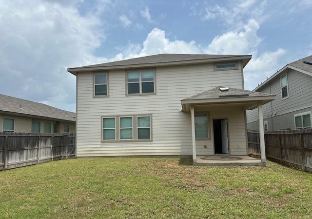 12906 Awuzie Trl, San Antonio, TX 78254 - back of property featuring a fenced backyard