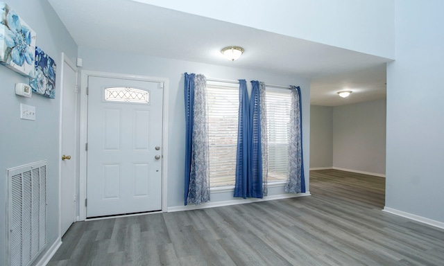 22635 River Birch Dr, Tomball, TX 77375 - entrance foyer featuring wood finished floors and baseboards