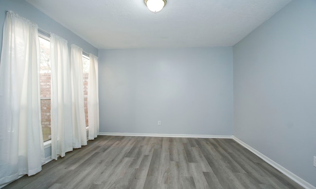 22635 River Birch Dr, Tomball, TX 77375 - unfurnished room featuring wood finished floors