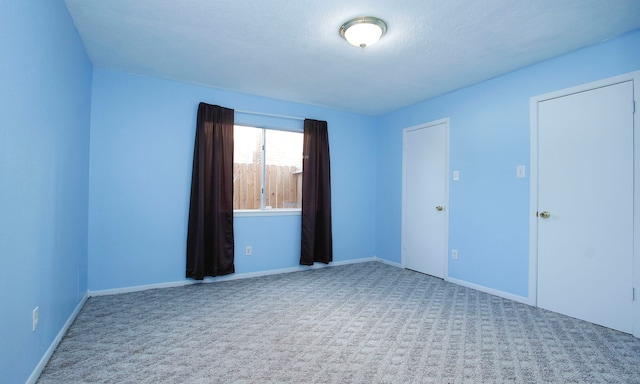22635 River Birch Dr, Tomball, TX 77375 - carpeted spare room featuring baseboards