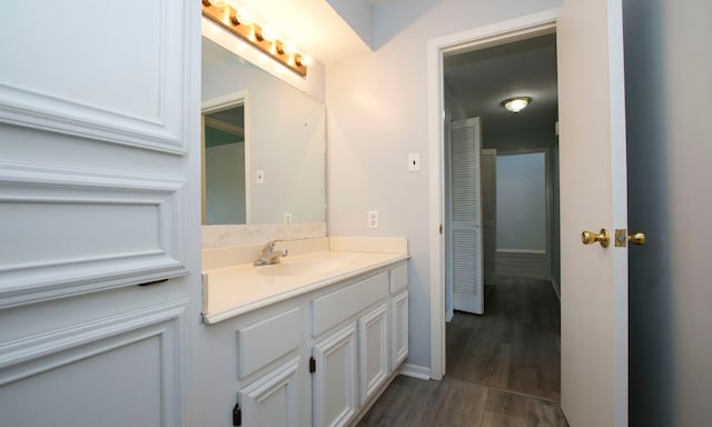 22635 River Birch Dr, Tomball, TX 77375 - bathroom featuring vanity and wood finished floors