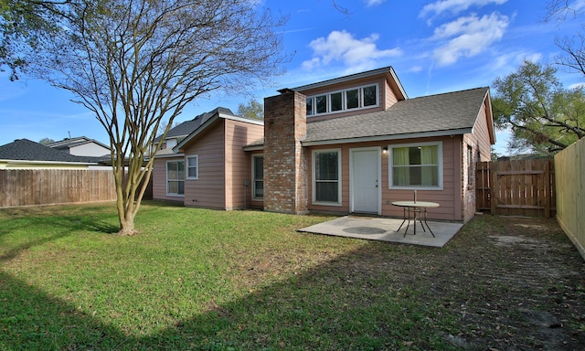 22635 River Birch Dr, Tomball, TX 77375 - rear view of property with roof with shingles, a fenced backyard, and a patio area