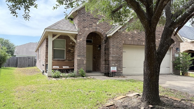20530 Keegans Ledge Ln, Cypress, TX 77433 - view of front of house with brick siding, a shingled roof, an attached garage, and driveway