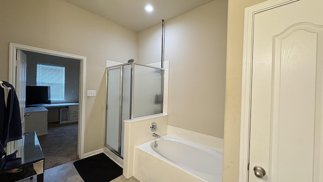 20530 Keegans Ledge Ln, Cypress, TX 77433 - bathroom featuring a shower stall, a bath, and recessed lighting