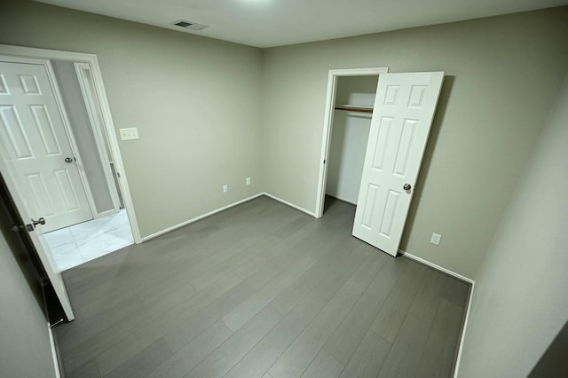 18927 Remington Bend Dr, Houston, TX 77073 - unfurnished bedroom with wood finished floors and a closet