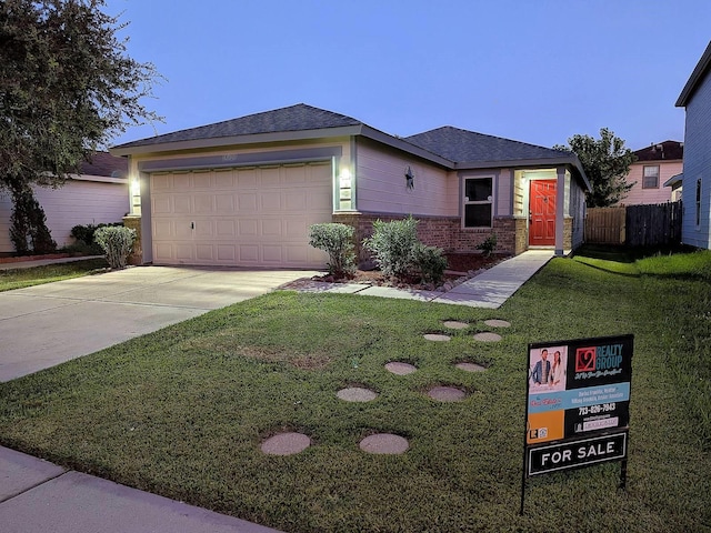 18927 Remington Bend Dr, Houston, TX 77073 - view of front of house featuring brick siding, a garage, concrete driveway, and a shingled roof