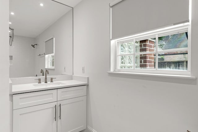 2409 Dryden Rd, Houston, TX 77030 - bathroom with vanity, a shower, and recessed lighting