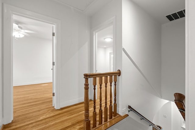 2409 Dryden Rd, Houston, TX 77030 - staircase with attic access, wood finished floors, and ceiling fan