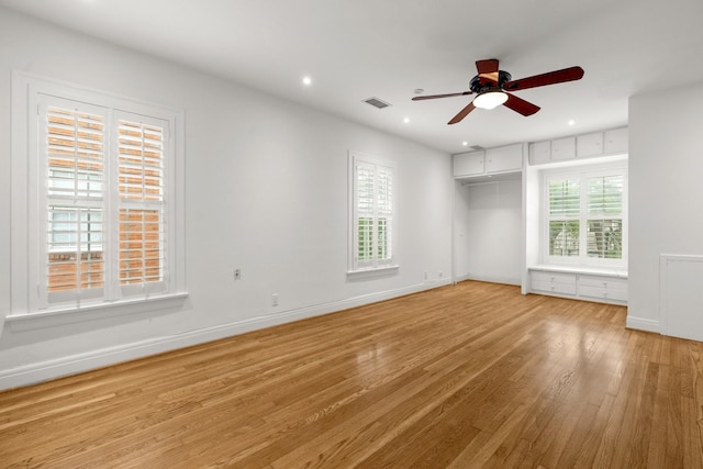 2409 Dryden Rd, Houston, TX 77030 - spare room with light wood-style flooring, ceiling fan, plenty of natural light, and recessed lighting
