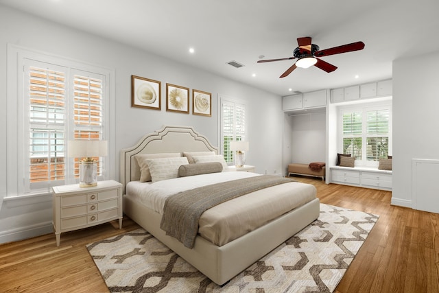 2409 Dryden Rd, Houston, TX 77030 - bedroom featuring light wood-style flooring, recessed lighting, and a ceiling fan