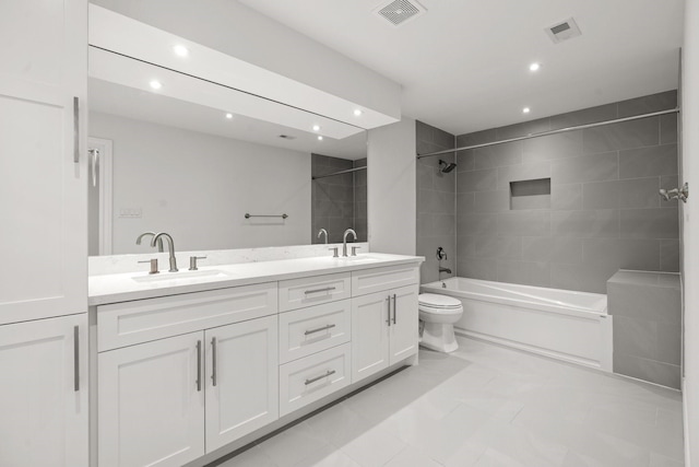 2409 Dryden Rd, Houston, TX 77030 - bathroom featuring recessed lighting, double vanity, marble finish flooring, and shower / bathtub combination