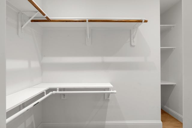 2409 Dryden Rd, Houston, TX 77030 - spacious closet with light wood finished floors