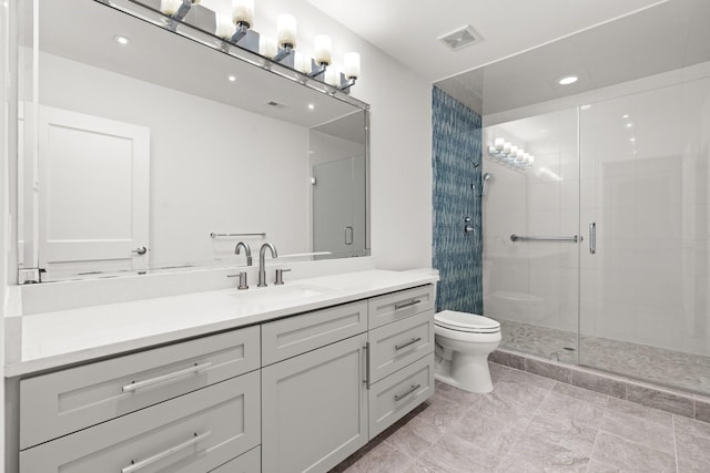 2409 Dryden Rd, Houston, TX 77030 - bathroom with vanity, a shower stall, and recessed lighting
