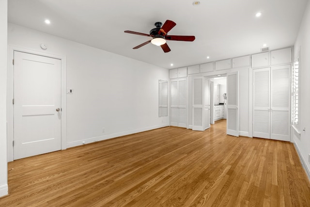 2409 Dryden Rd, Houston, TX 77030 - unfurnished bedroom with light wood finished floors, recessed lighting, and ceiling fan