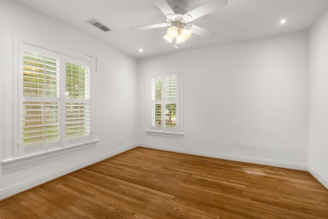 2409 Dryden Rd, Houston, TX 77030 - spare room with wood finished floors, a ceiling fan, and recessed lighting