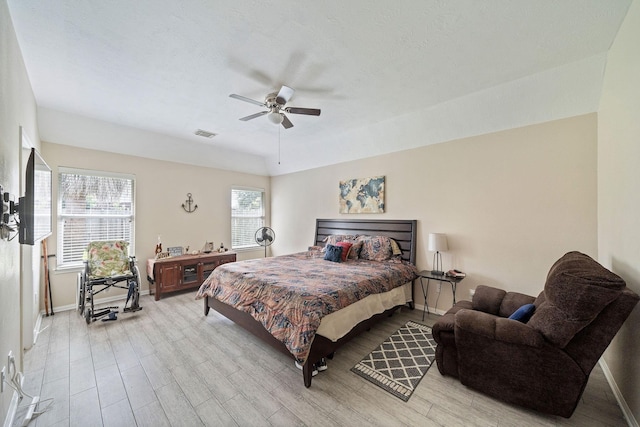 3261 Gladewater Ln, League City, TX 77573 - bedroom featuring wood finished floors and a ceiling fan
