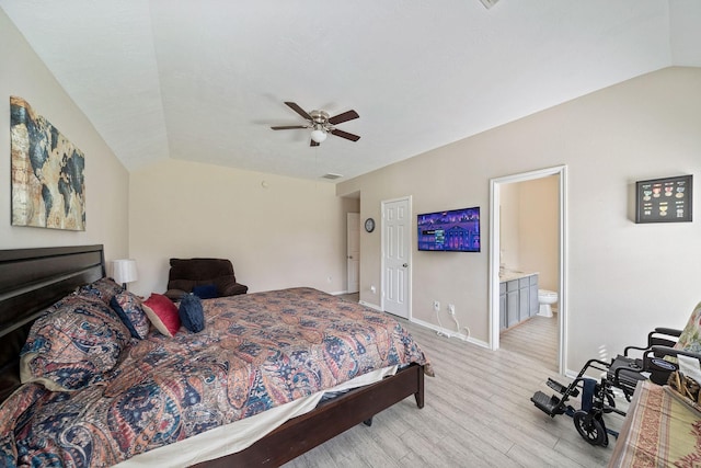3261 Gladewater Ln, League City, TX 77573 - bedroom with light wood-style floors, vaulted ceiling, ensuite bathroom, and a ceiling fan