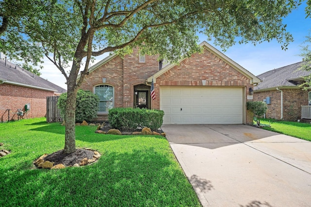 3261 Gladewater Ln, League City, TX 77573 - view of front facade with brick siding, driveway, a front yard, and an attached garage