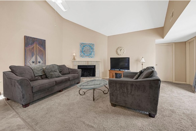 9809 Richmond Ave Unit 8, Houston, TX 77042 - living room featuring carpet, lofted ceiling, and a brick fireplace