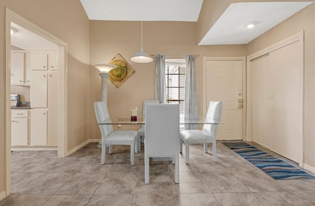 9809 Richmond Ave Unit 8, Houston, TX 77042 - dining space with baseboards