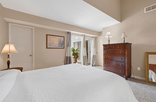 9809 Richmond Ave Unit 8, Houston, TX 77042 - carpeted bedroom with access to outside