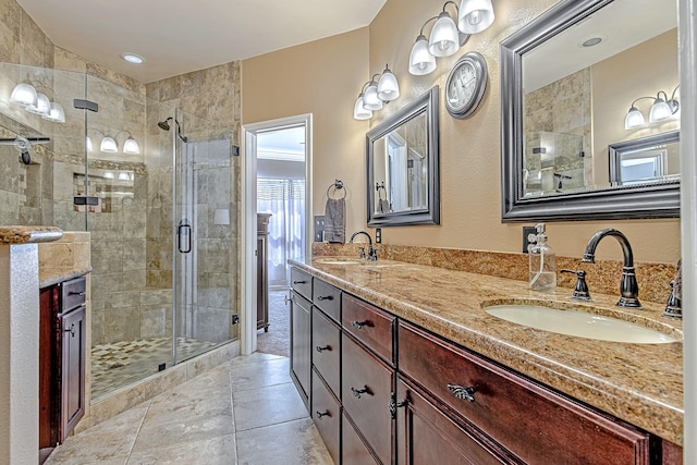 2315 Huldy St, Houston, TX 77019 - bathroom with double vanity, a stall shower, and tile patterned floors