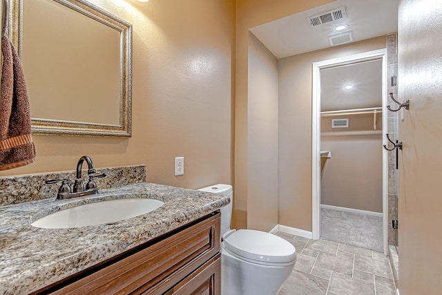 2315 Huldy St, Houston, TX 77019 - bathroom with vanity and stone finish flooring