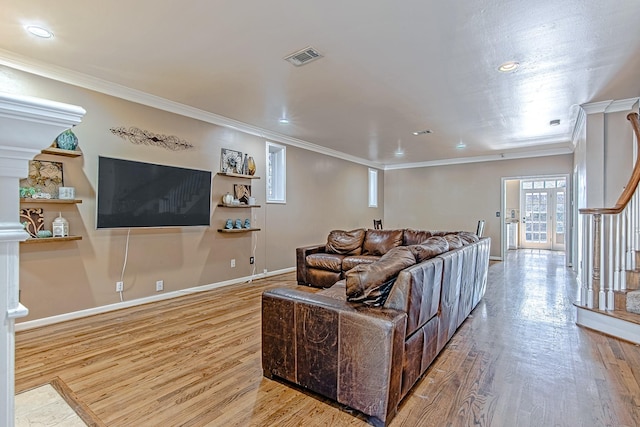 2315 Huldy St, Houston, TX 77019 - living area with wood finished floors, ornamental molding, recessed lighting, and decorative columns