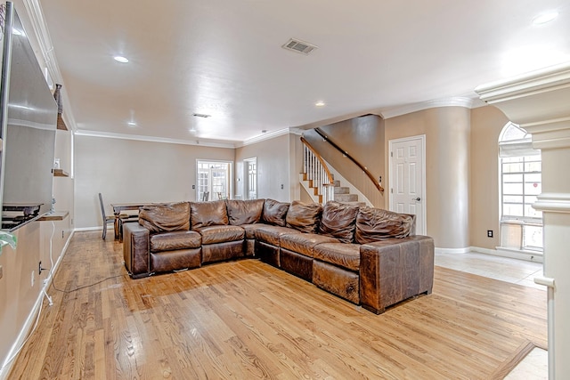 2315 Huldy St, Houston, TX 77019 - living room with ornamental molding, plenty of natural light, stairs, light wood-style flooring, and recessed lighting
