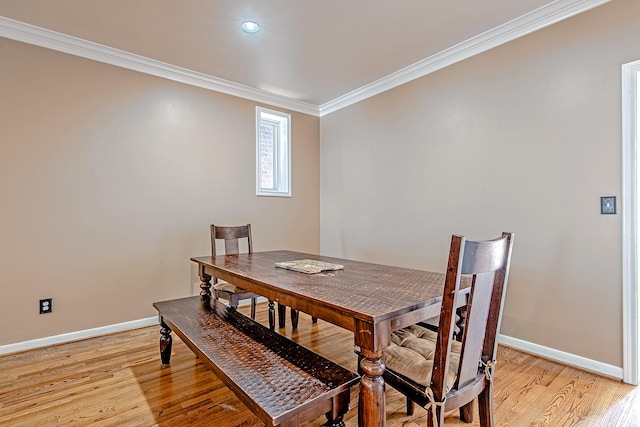 2315 Huldy St, Houston, TX 77019 - dining room featuring ornamental molding, light wood-style floors, and recessed lighting