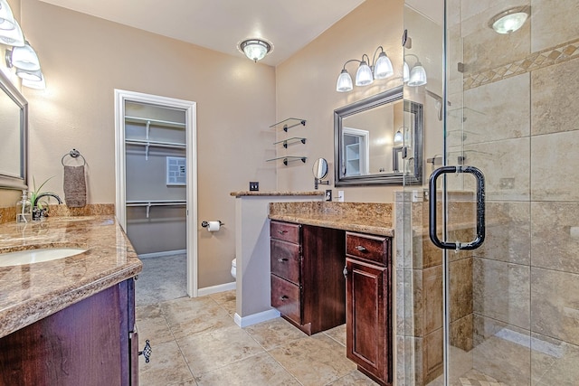 2315 Huldy St, Houston, TX 77019 - full bath with a stall shower, two vanities, tile patterned floors, and a spacious closet