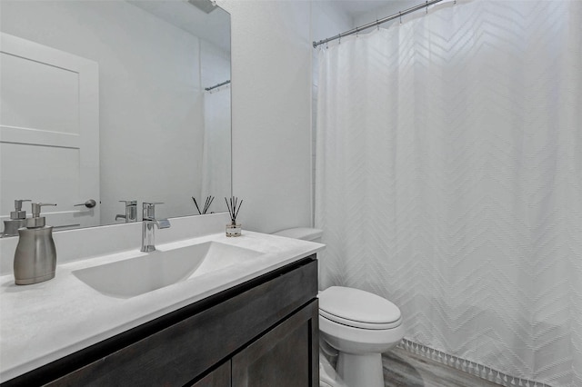 3368 Voda Bend Dr, Katy, TX 77493 - full bathroom featuring vanity, wood finished floors, and a shower with shower curtain