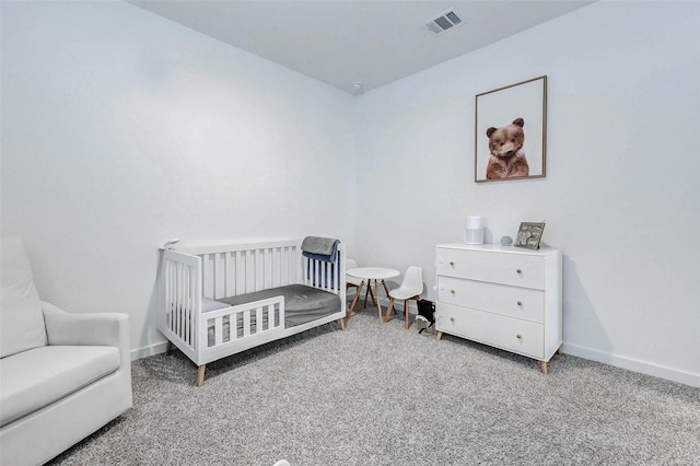 3368 Voda Bend Dr, Katy, TX 77493 - carpeted bedroom featuring a crib and baseboards