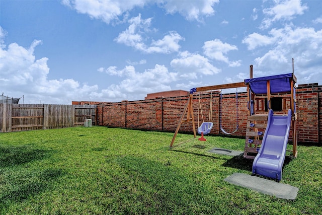 3368 Voda Bend Dr, Katy, TX 77493 - fenced backyard featuring a playground