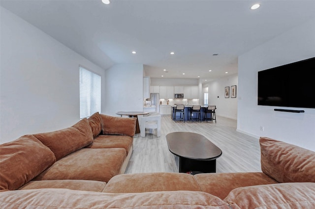 3368 Voda Bend Dr, Katy, TX 77493 - living area featuring light wood-style flooring and recessed lighting