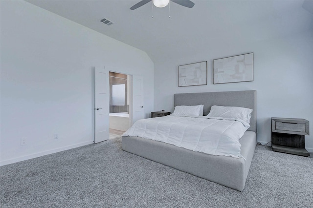 3368 Voda Bend Dr, Katy, TX 77493 - carpeted bedroom featuring lofted ceiling, connected bathroom, and a ceiling fan