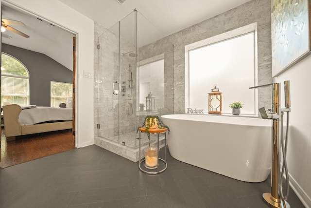 3803 Caleb Ln, Missouri City, TX 77459 - full bath featuring ensuite bathroom, a stall shower, a freestanding tub, ceiling fan, and tile patterned floors