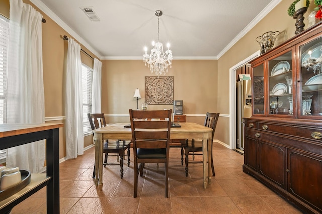 3803 Caleb Ln, Missouri City, TX 77459 - dining room featuring a chandelier, ornamental molding, and tile patterned flooring