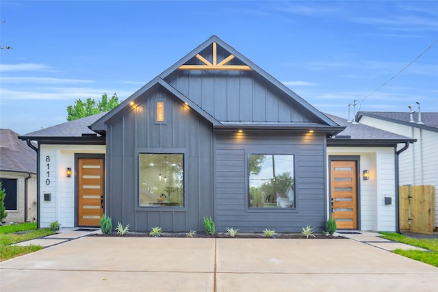 8110 Brandon St, Houston, TX 77051 - view of front of home featuring board and batten siding and roof with shingles