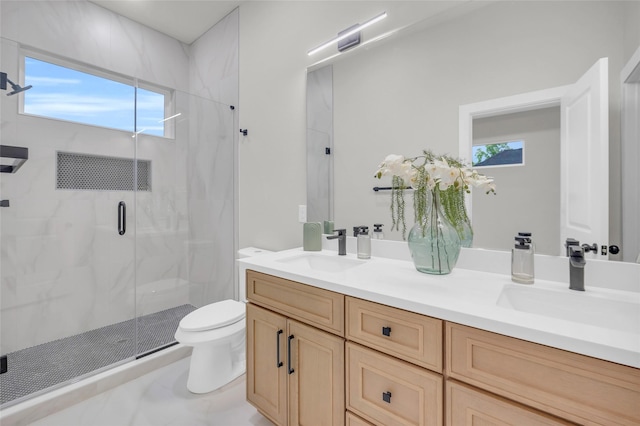 8110 Brandon St, Houston, TX 77051 - bathroom featuring a marble finish shower and double vanity