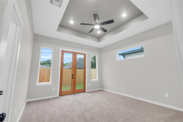 8110 Brandon St, Houston, TX 77051 - carpeted spare room with french doors, a raised ceiling, ceiling fan, and recessed lighting