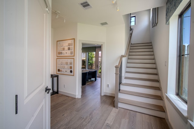 1720 Sedola Ln, Houston, TX 77055 - stairs with rail lighting and wood finished floors