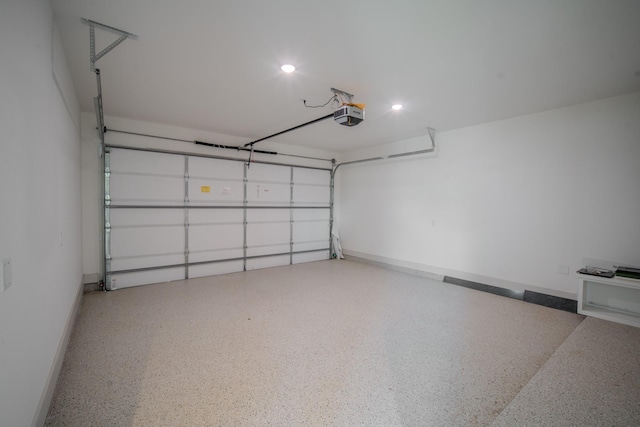 1720 Sedola Ln, Houston, TX 77055 - garage featuring a garage door opener and recessed lighting