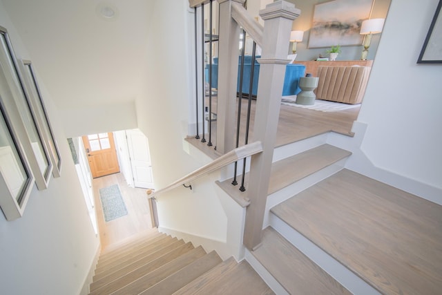 1720 Sedola Ln, Houston, TX 77055 - stairs featuring wood finished floors and radiator