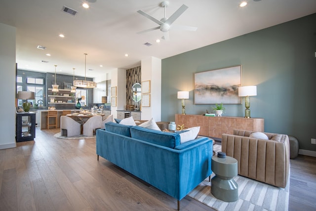 1720 Sedola Ln, Houston, TX 77055 - living area with wood finished floors, ceiling fan, and recessed lighting