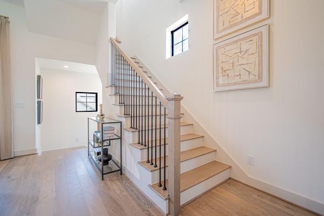 1720 Sedola Ln, Houston, TX 77055 - stairway featuring wood finished floors and recessed lighting