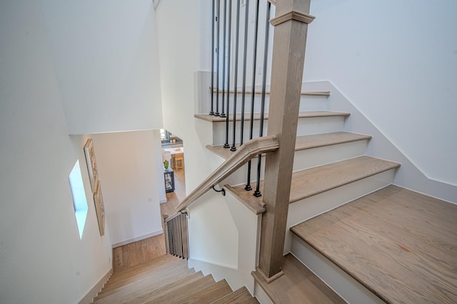 1720 Sedola Ln, Houston, TX 77055 - stairs featuring wood finished floors