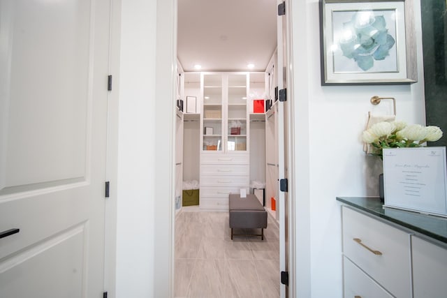 1720 Sedola Ln, Houston, TX 77055 - hall with recessed lighting and light tile patterned flooring