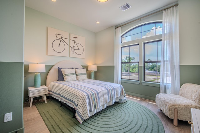 1720 Sedola Ln, Houston, TX 77055 - bedroom with wood finished floors and recessed lighting